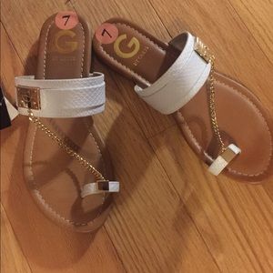 Guess shoes. Brand new. Never worn. They don’t fit